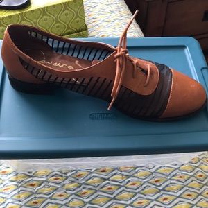 Camel and navy closed toe shoe